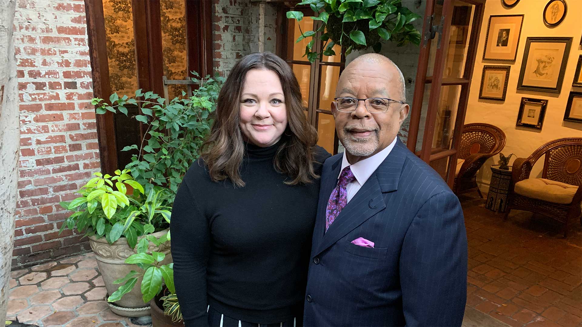 Melissa McCarthy and Host Henry Louis Gates, Jr.
