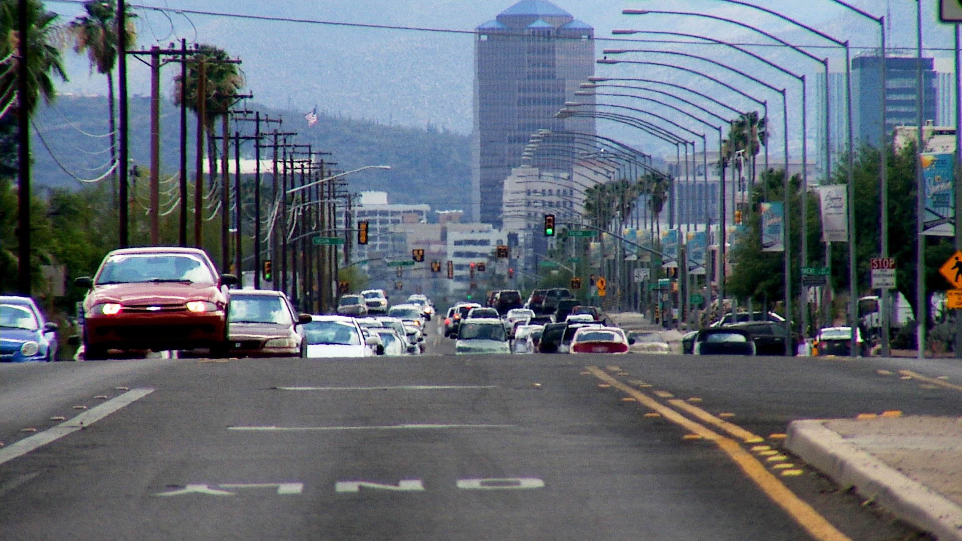 Downtown Tucson is seen in the distance from the intersection of Broadway Boulevard and Country Club Road. 