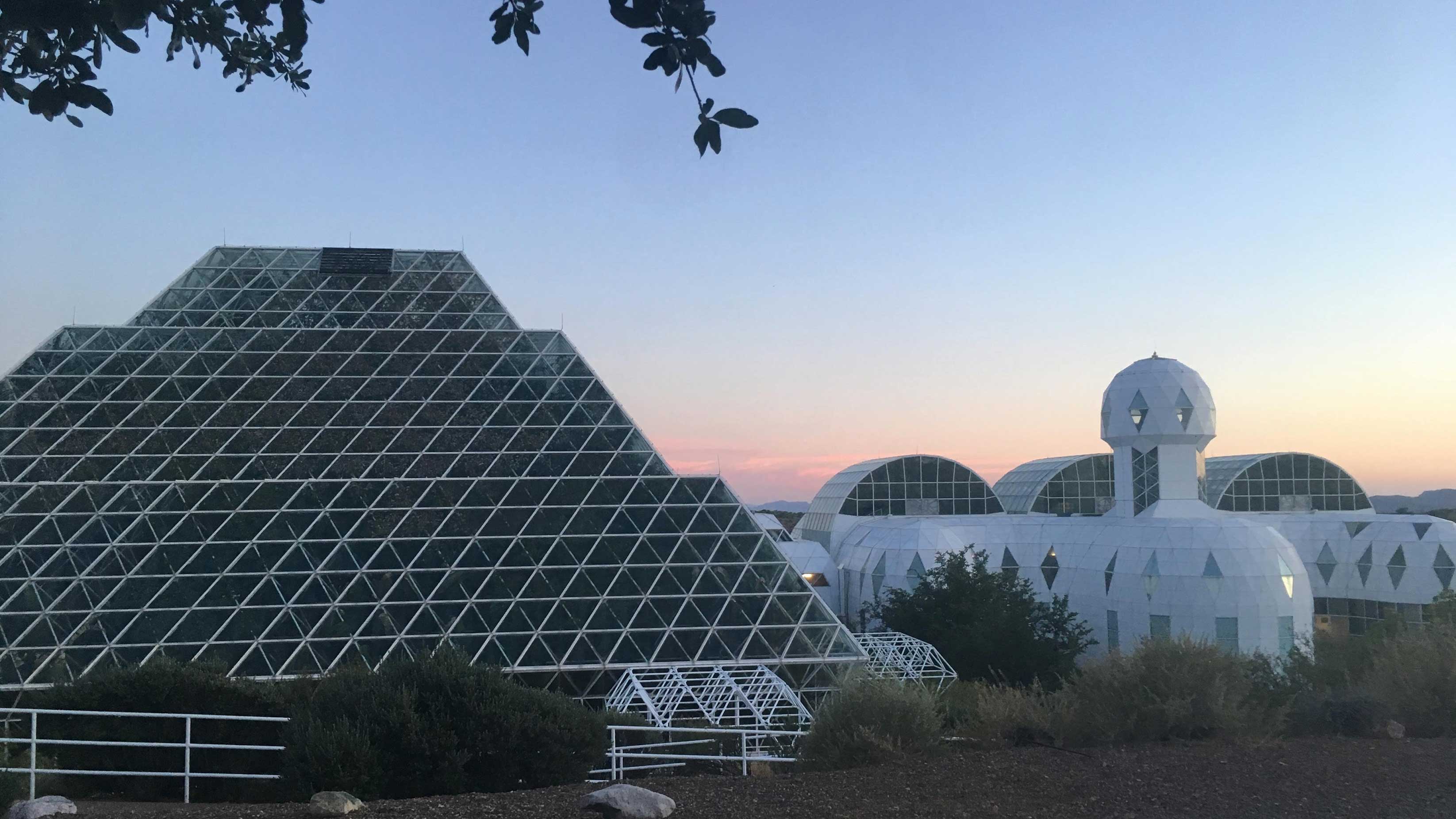 Biosphere 2's iconc glass-walled rainforest, left, has been closed while scientists conduct a four-month drought study.