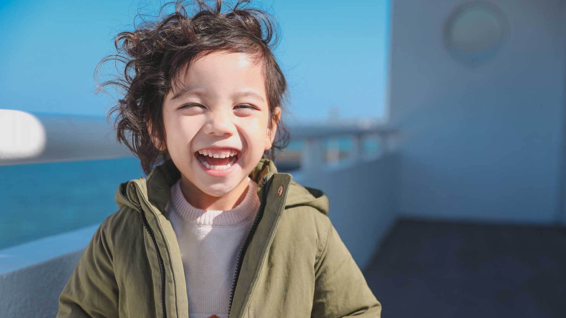 A child smiling.