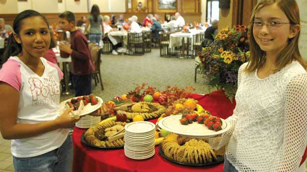 Friends enjoying a Thanksgiving meal.