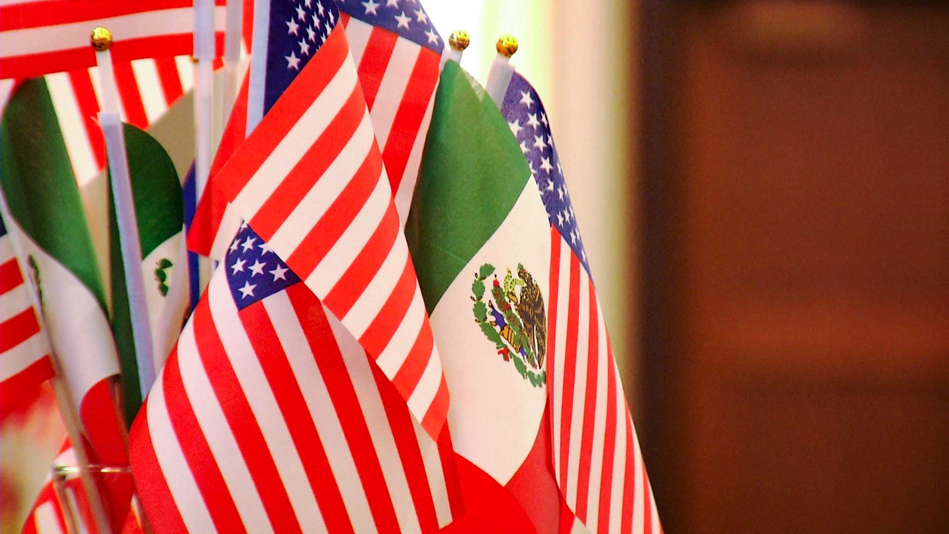 U.S. and Mexico flags. 