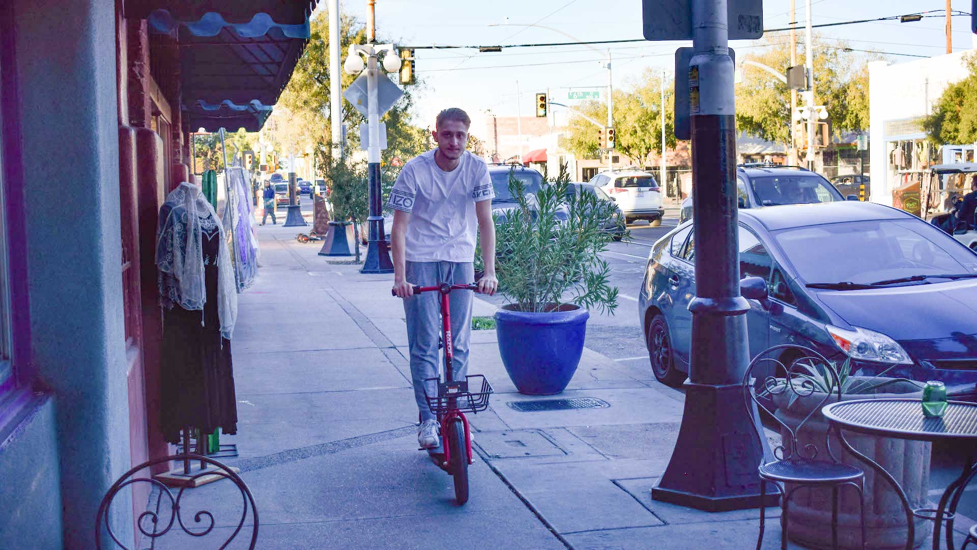 scooter-rider-sidewalk