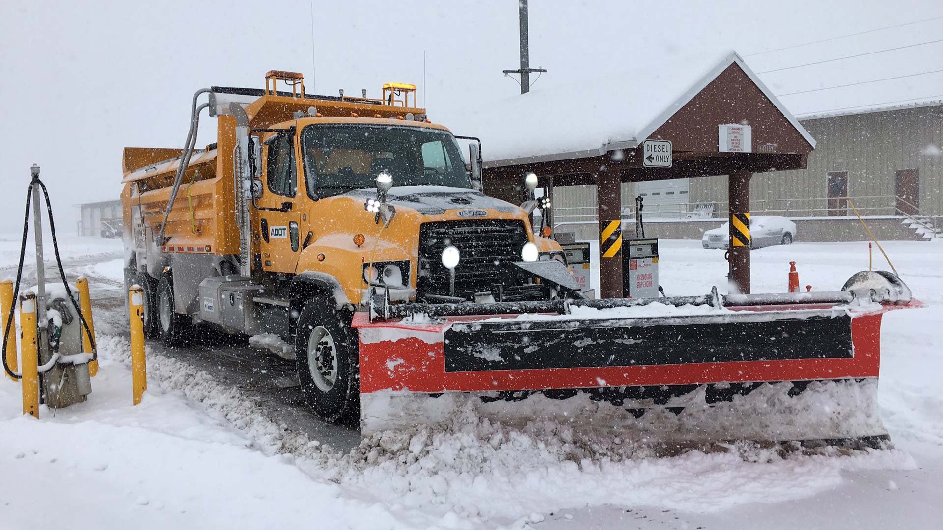 A plow refuels in the Flagstaff area, Feb. 21, 2019.