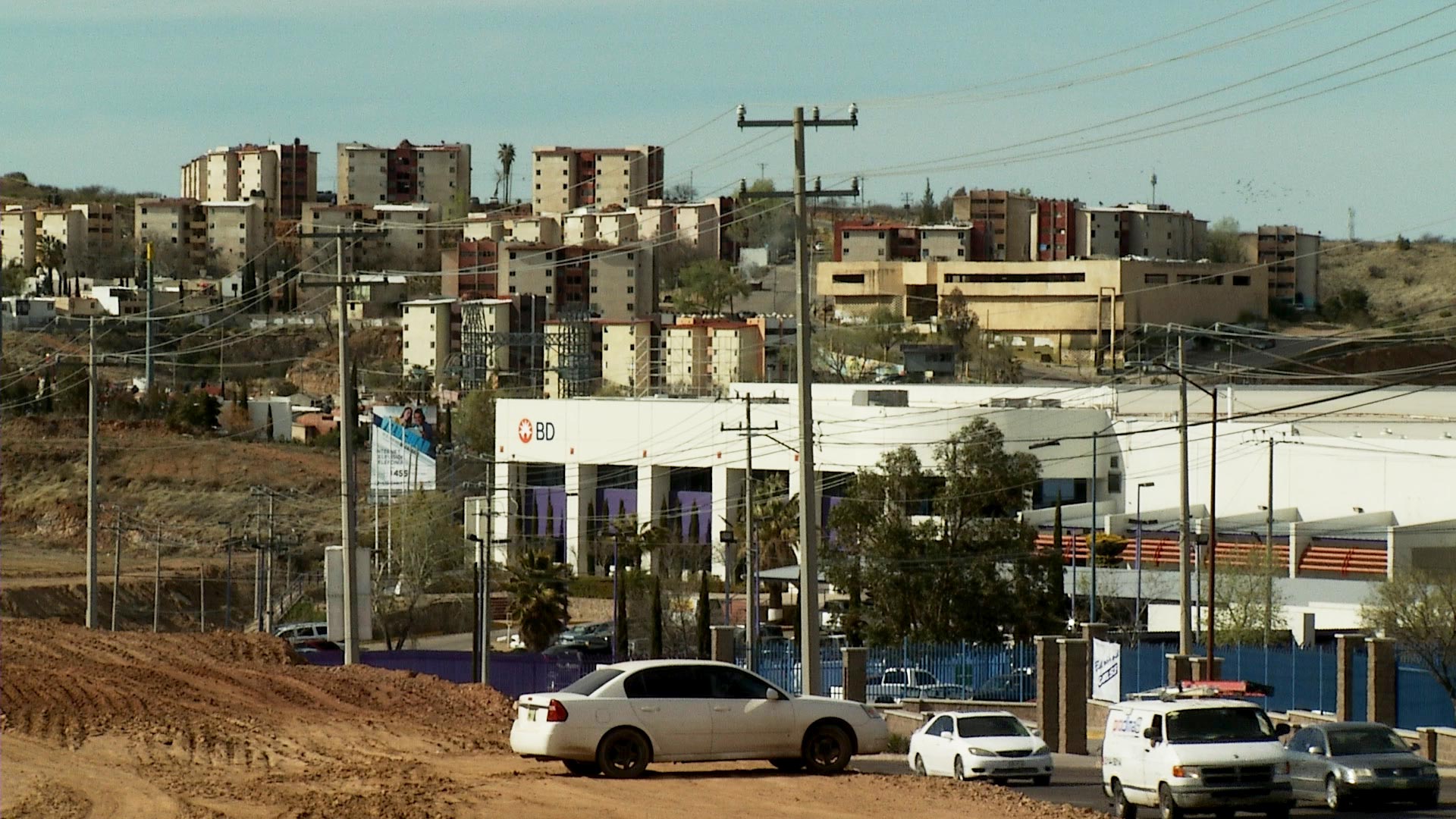 Maquilas line the road in Nogales, Sonora a few miles south of the Mariposa Port of Entry, March 2019.