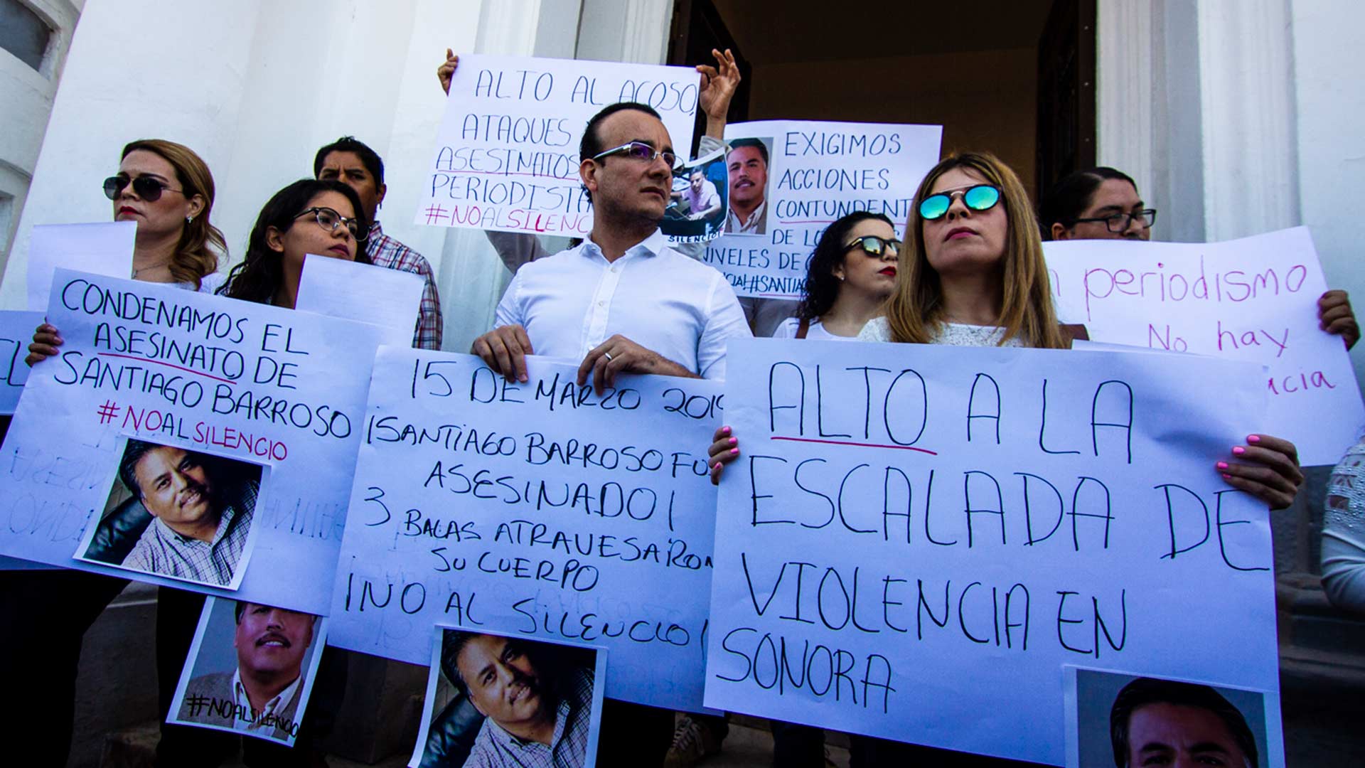 Protesting reporters stand in front of the Government Palace in Hermosillo to demand resolution of Santiago Barroso's murder as well as broader protection of press freedom.