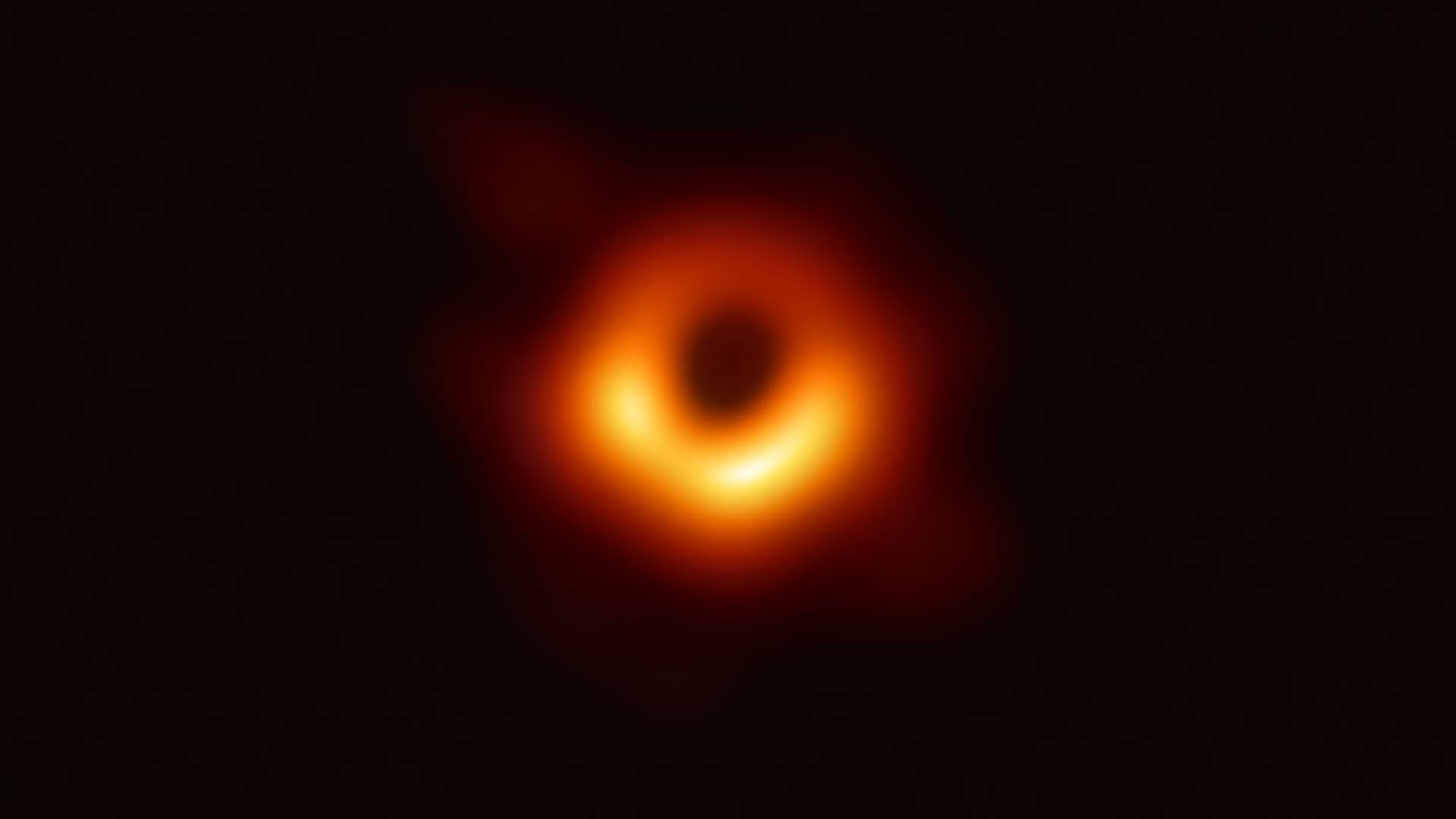 Hot gas swirls and outlines the black hole at the center of galaxy M87 under influence of gravity near its event horizon.
