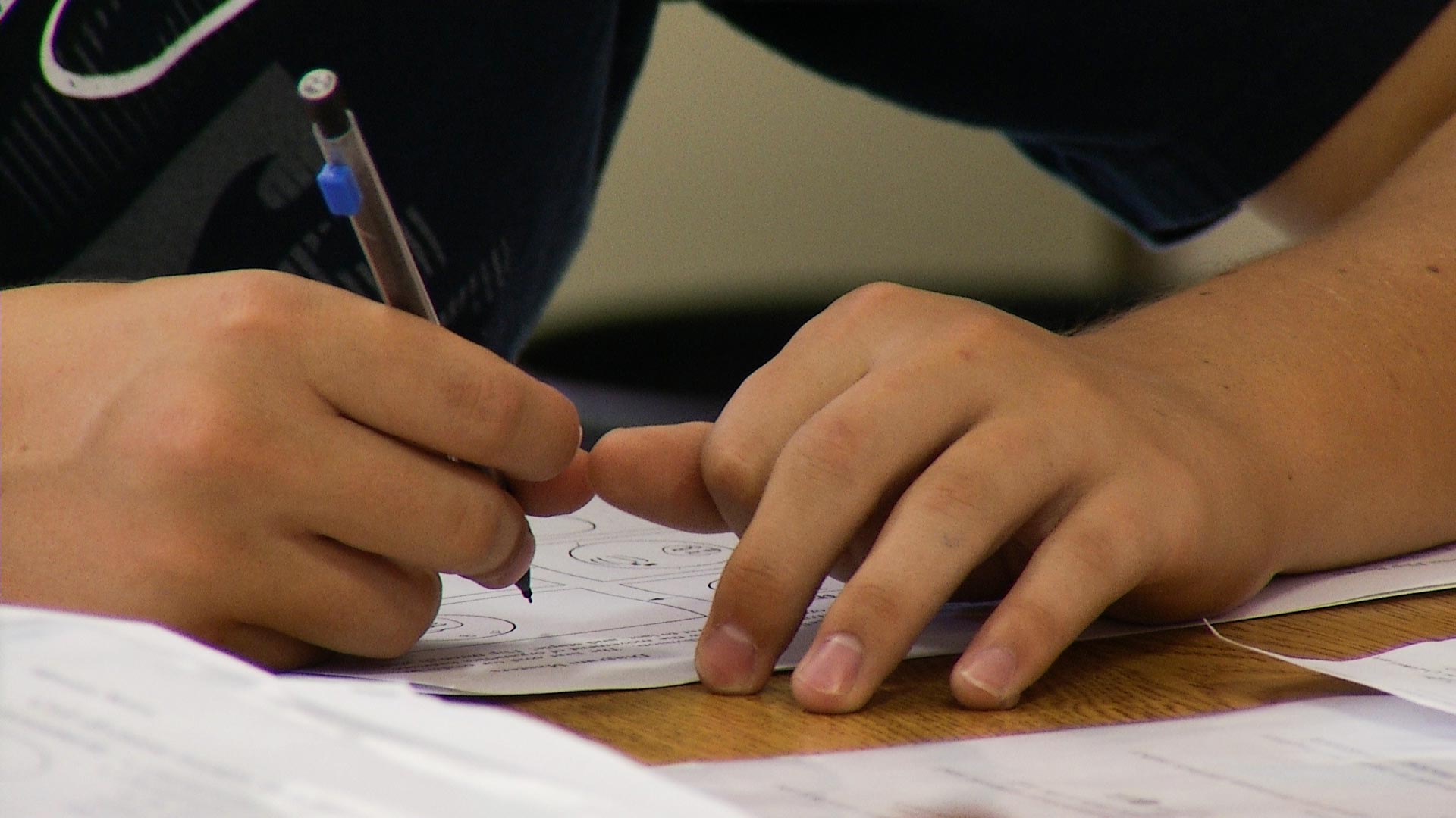 A student in the Vail School District works in class.