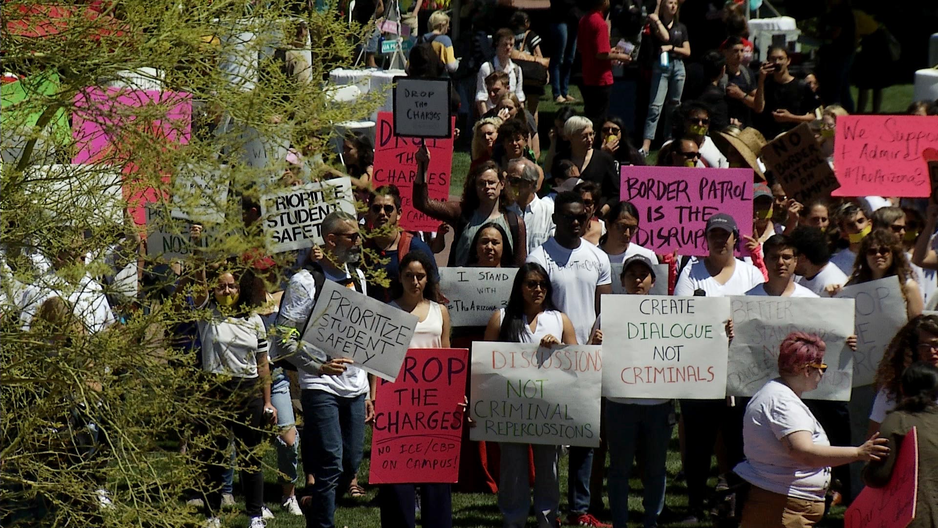 Protesters gather in front of Old Main at the University of Arizona on April 10, 2019. They were demonstrating in support of three students cited for protesting a presentation given in a classroom by Border Patrol agents in March. 