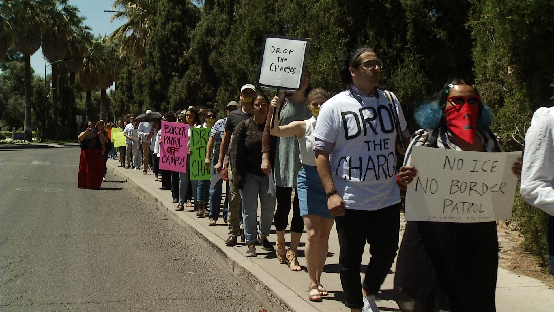 Protesters make their way to Old Main at the University of Arizona on April 10, 2019. They were demonstrating in support of three students cited for protesting a presentation given in a classroom by Border Patrol agents in March. 