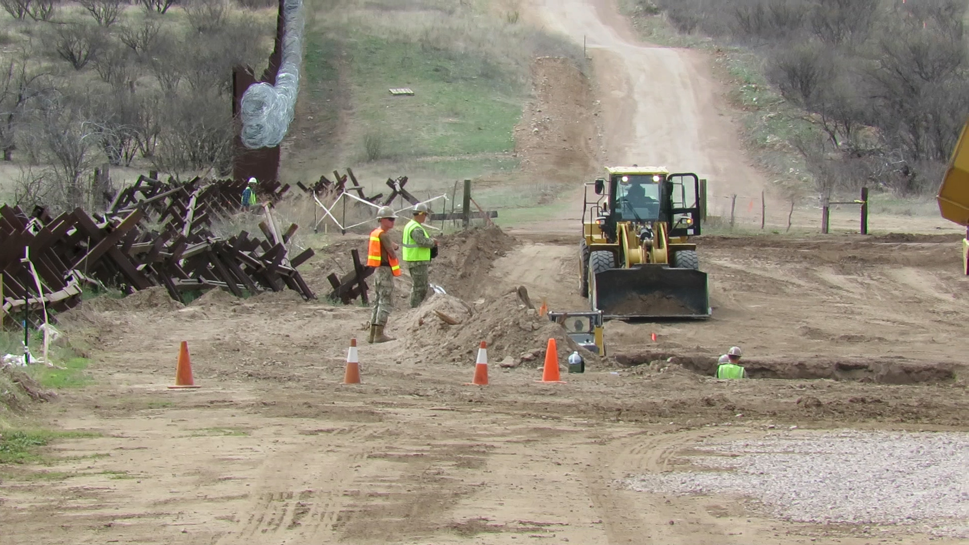 Navy Seabees, construction battalions building a bridge over the Santa Cruz River to make access for U.S. Border Patrol easier during flood season. (March 27, 2019)