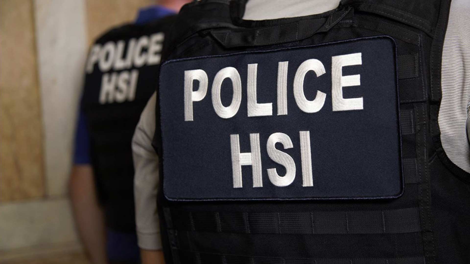 Department release photo of police with Immigration and Customs Enforcement’s (ICE) Homeland Security Investigations (HSI).