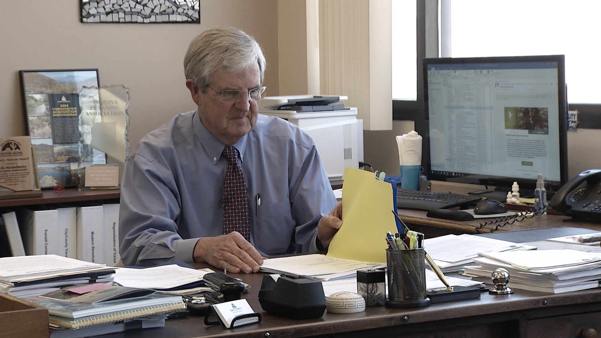 Pima County Administrator Chuck Huckelberry at his desk in 2019.