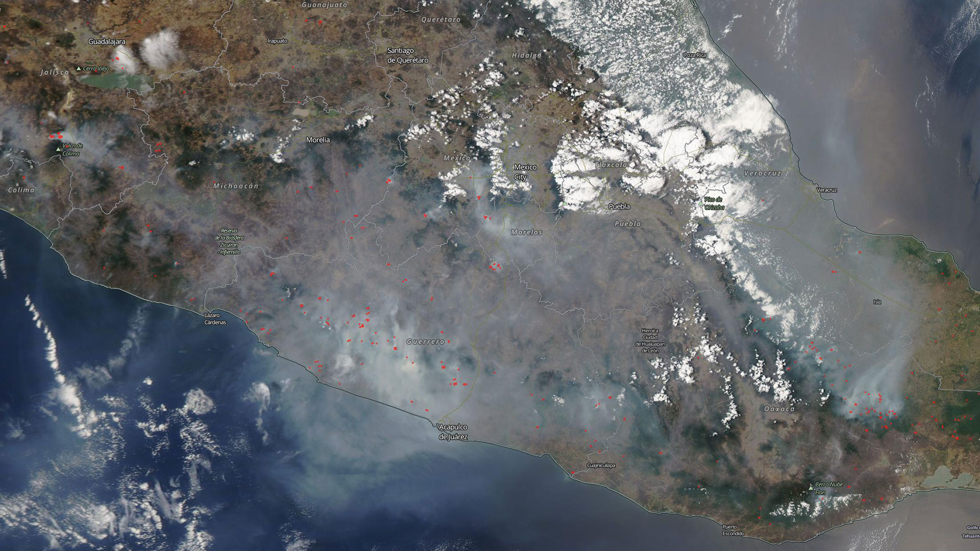 NASA Worldview snapshot over Mexico on May 12, 2019, red dots indicating active fires.