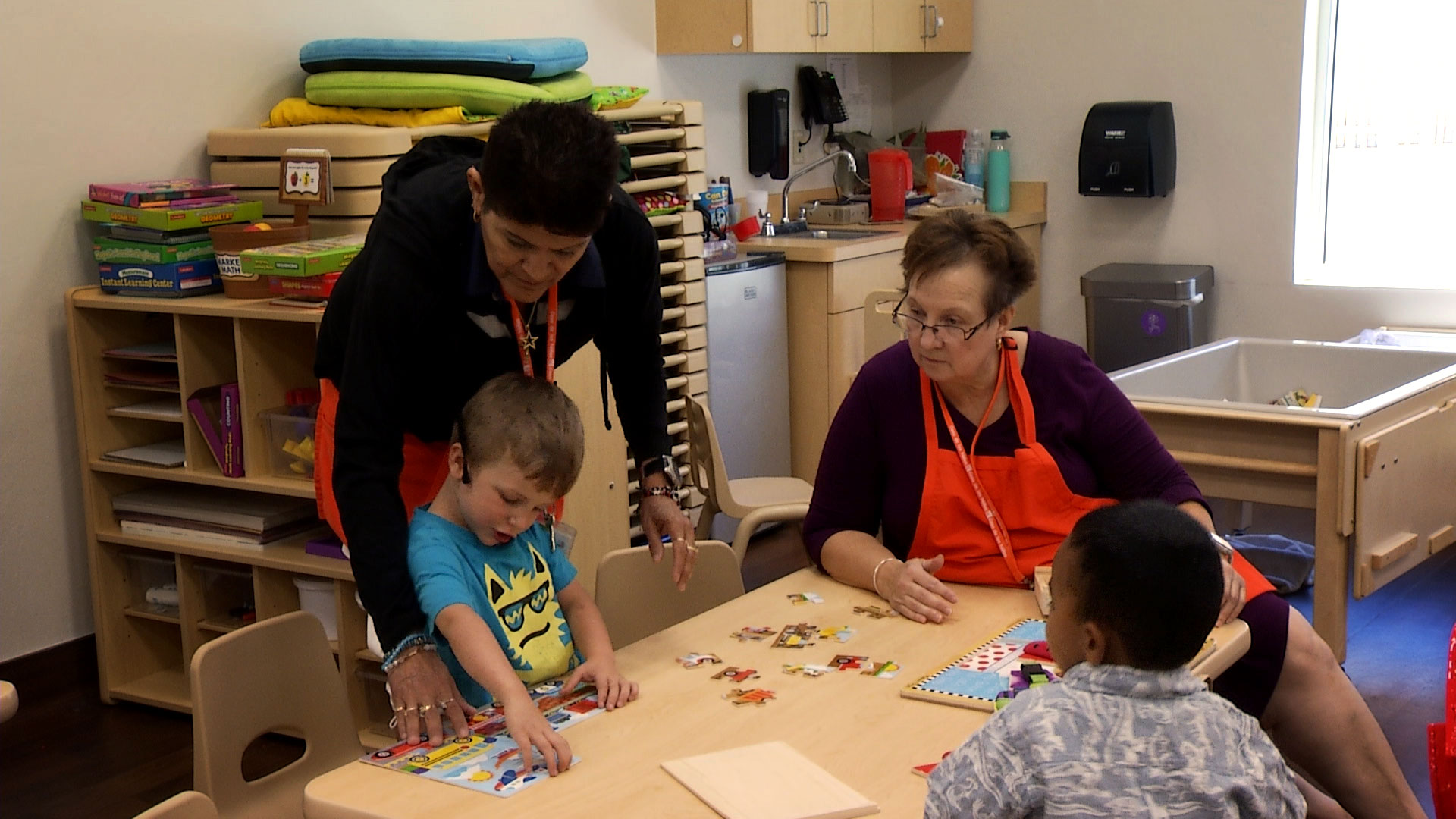 Instructors interact with preschool-aged children at the Casa de los Niños Kelly Early Education Center on May 29, 2019. 