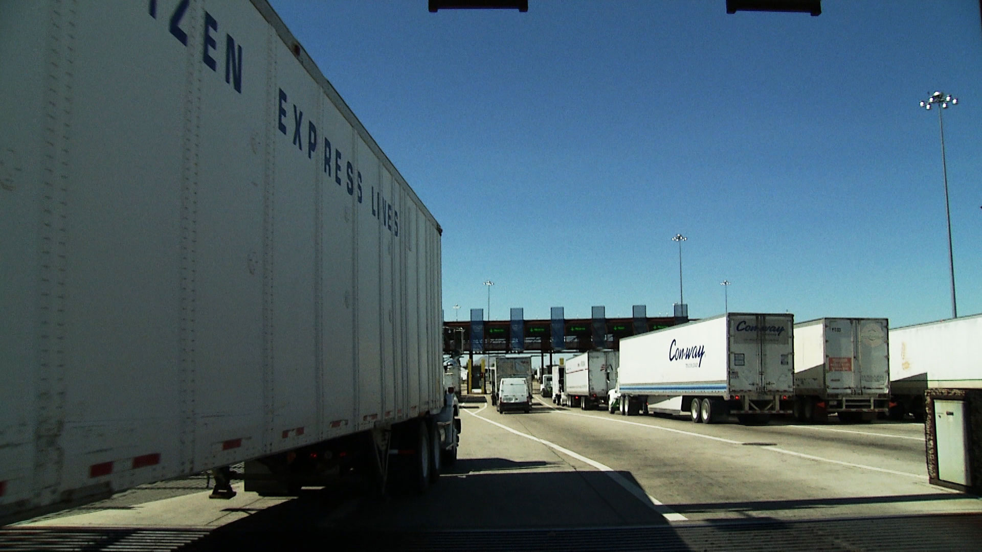 Commercial trucks travel through the Mariposa Port of Entry in Nogales. 