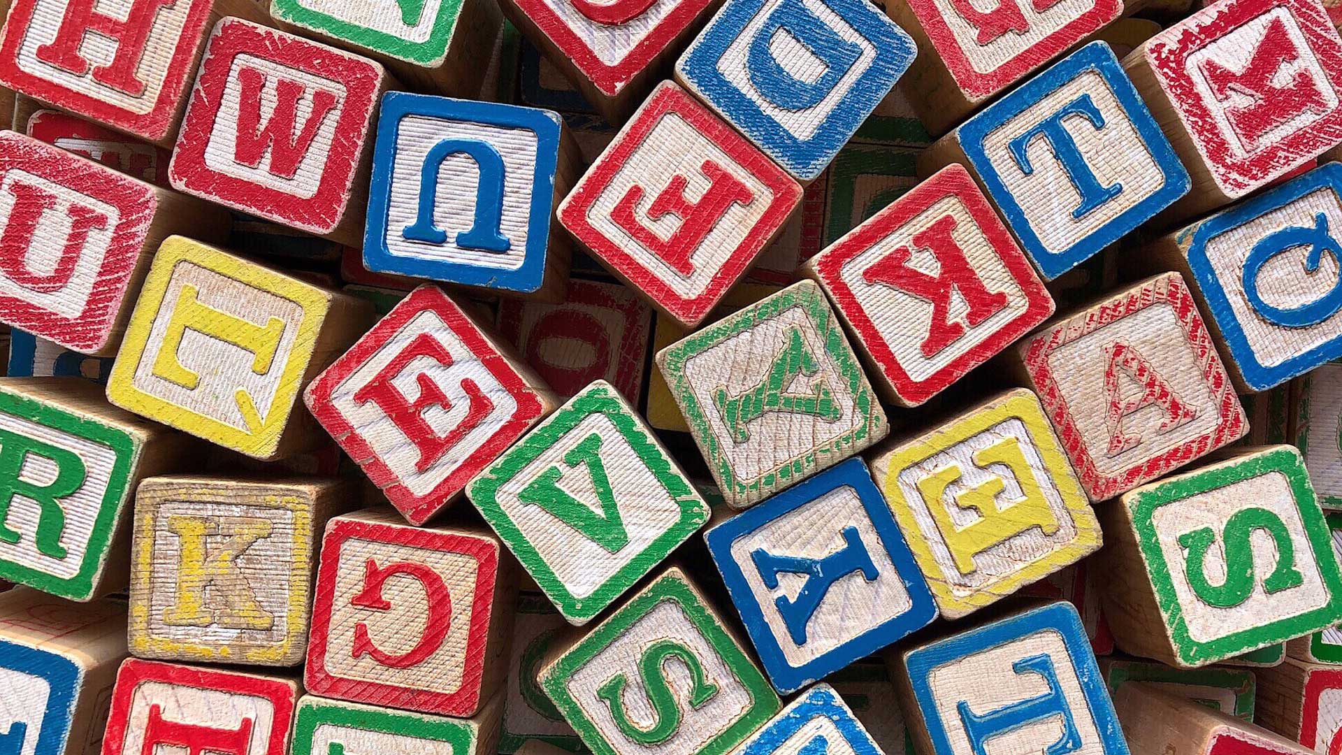 Toy blocks with letters on them.