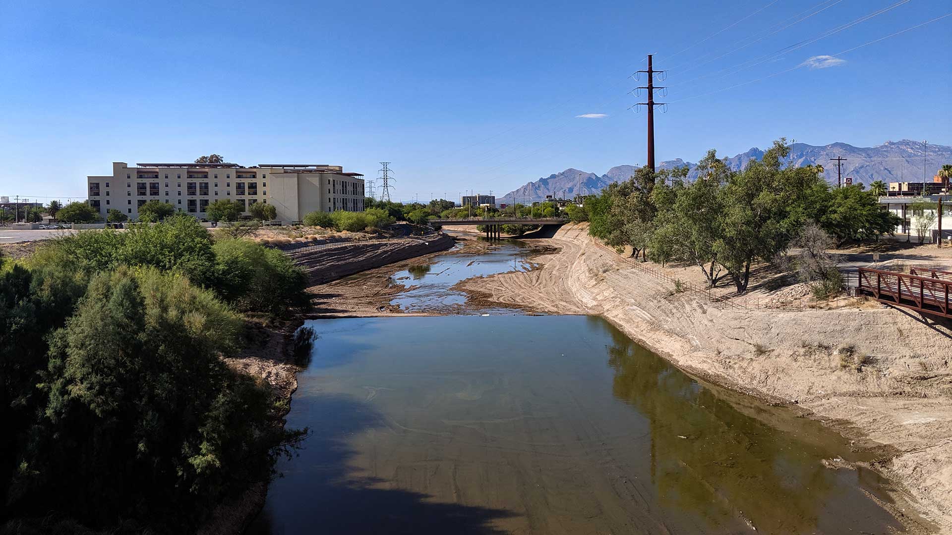 Water flows north of Cushing Street in the Santa Cruz River, midway through the first week of a project aiming to create a perennial flow in a section of the river, June 27, 2019.