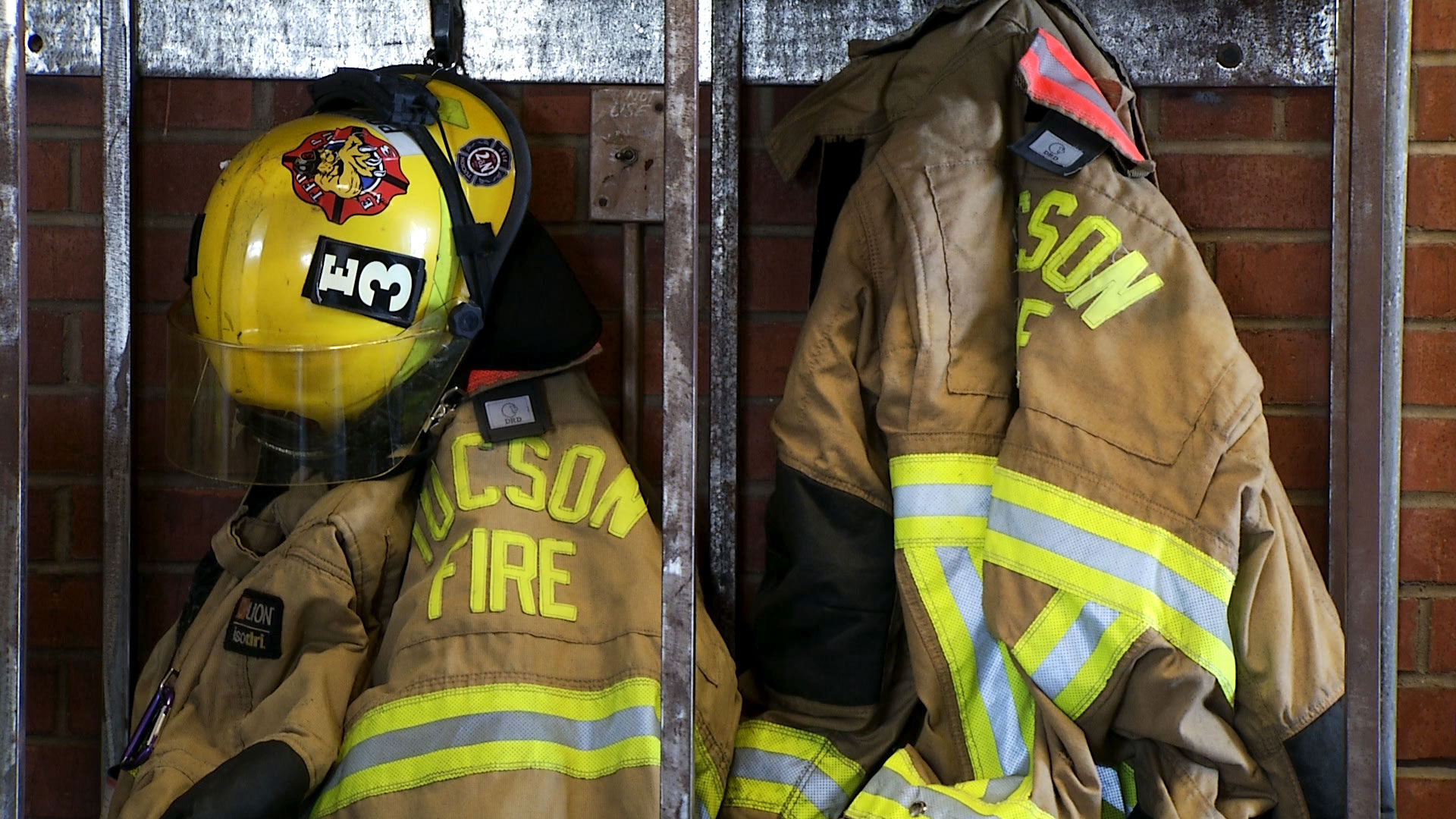 Firefighting gear hangs in the dock at Tucson Fire Station 3.