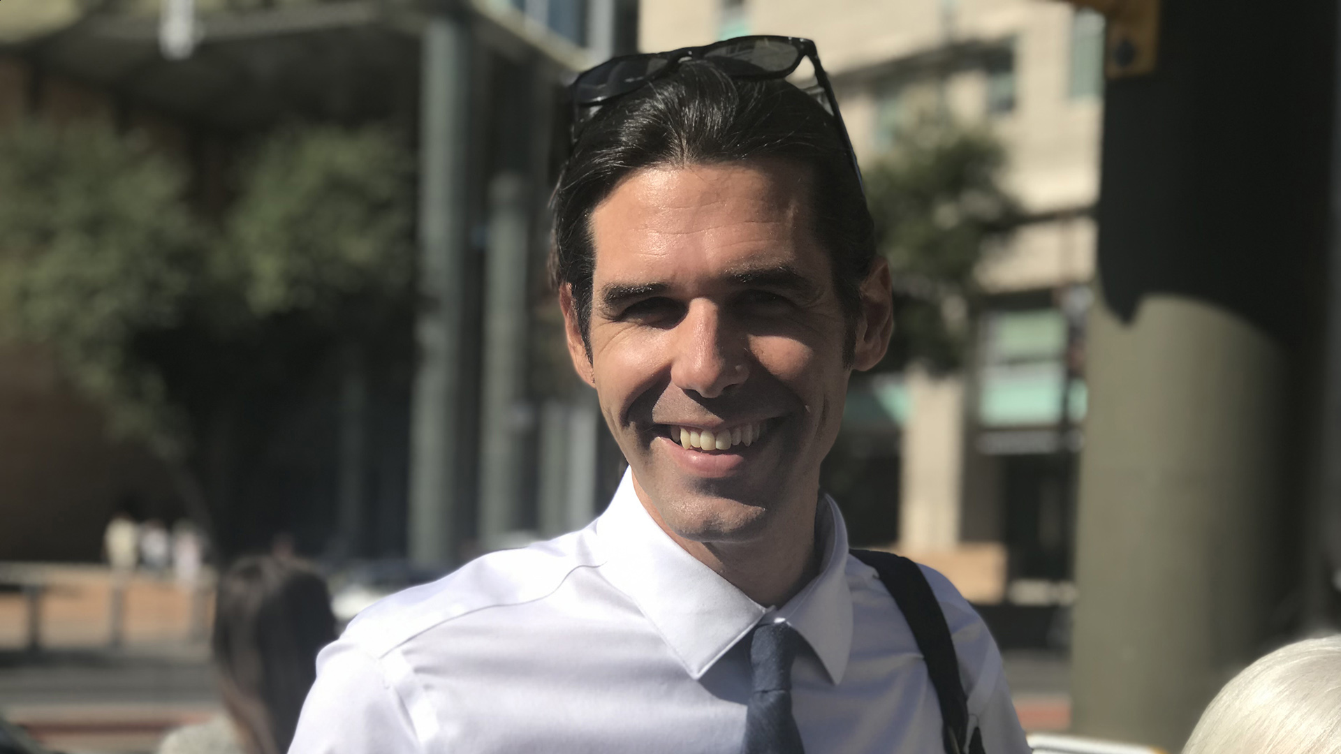 Scott Warren at a rally outside federal courthouse in Tucson before he enters, June 3. Warren is facing up to 20 years in prison for harboring undocumented immigrants. His supporters say Warren was offering only food, water, clothes and a safe place to sleep for those in need.