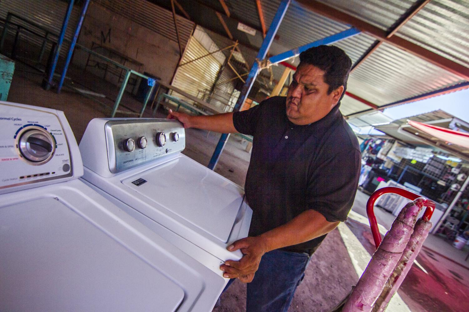 Said Bracamontes makes his living hauling used Arizona washers back Sonora and fixing them up for resale.