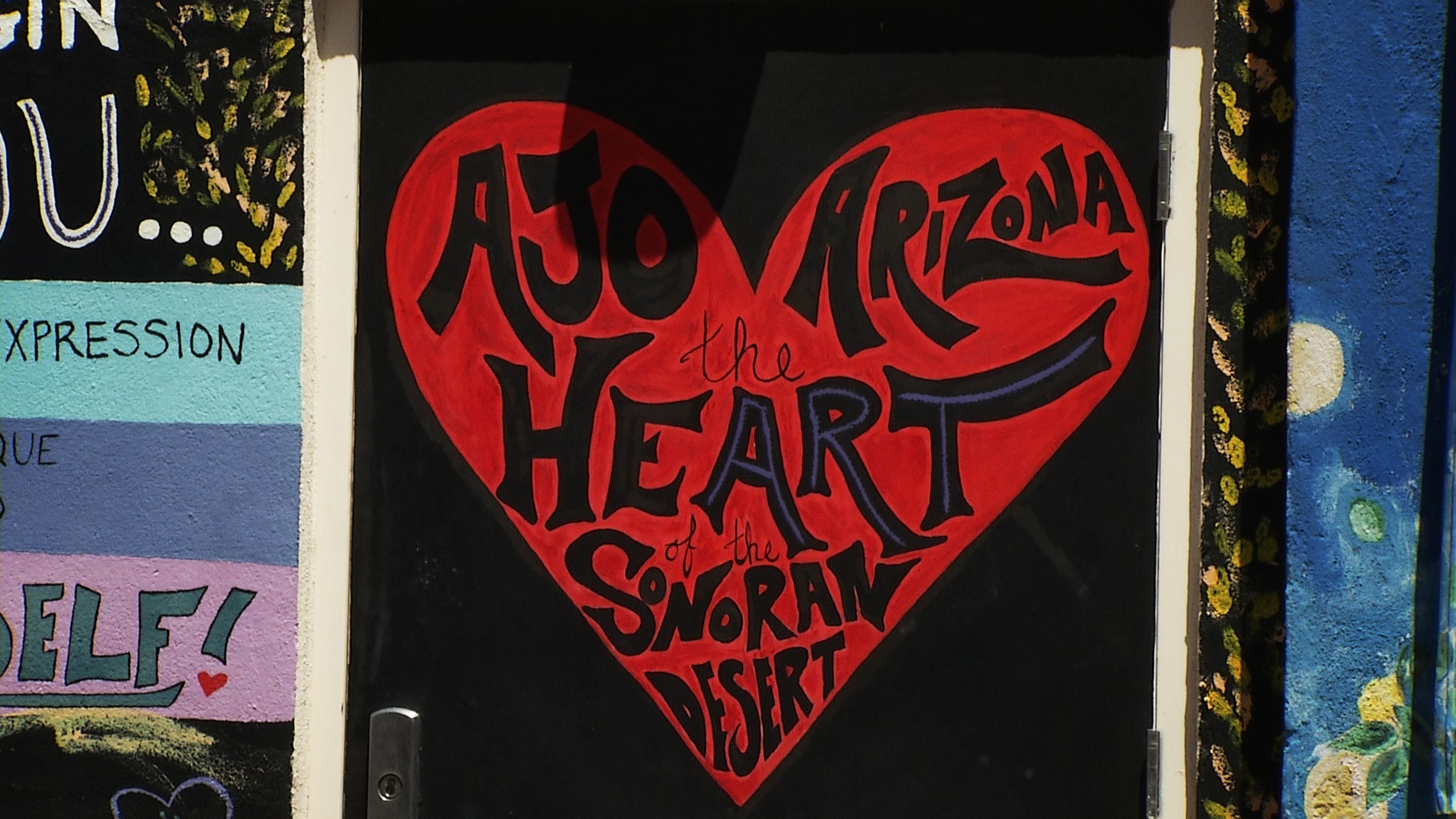 A closeup of a mural in Ajo touts itself as the heart of the Sonoran Desert. 