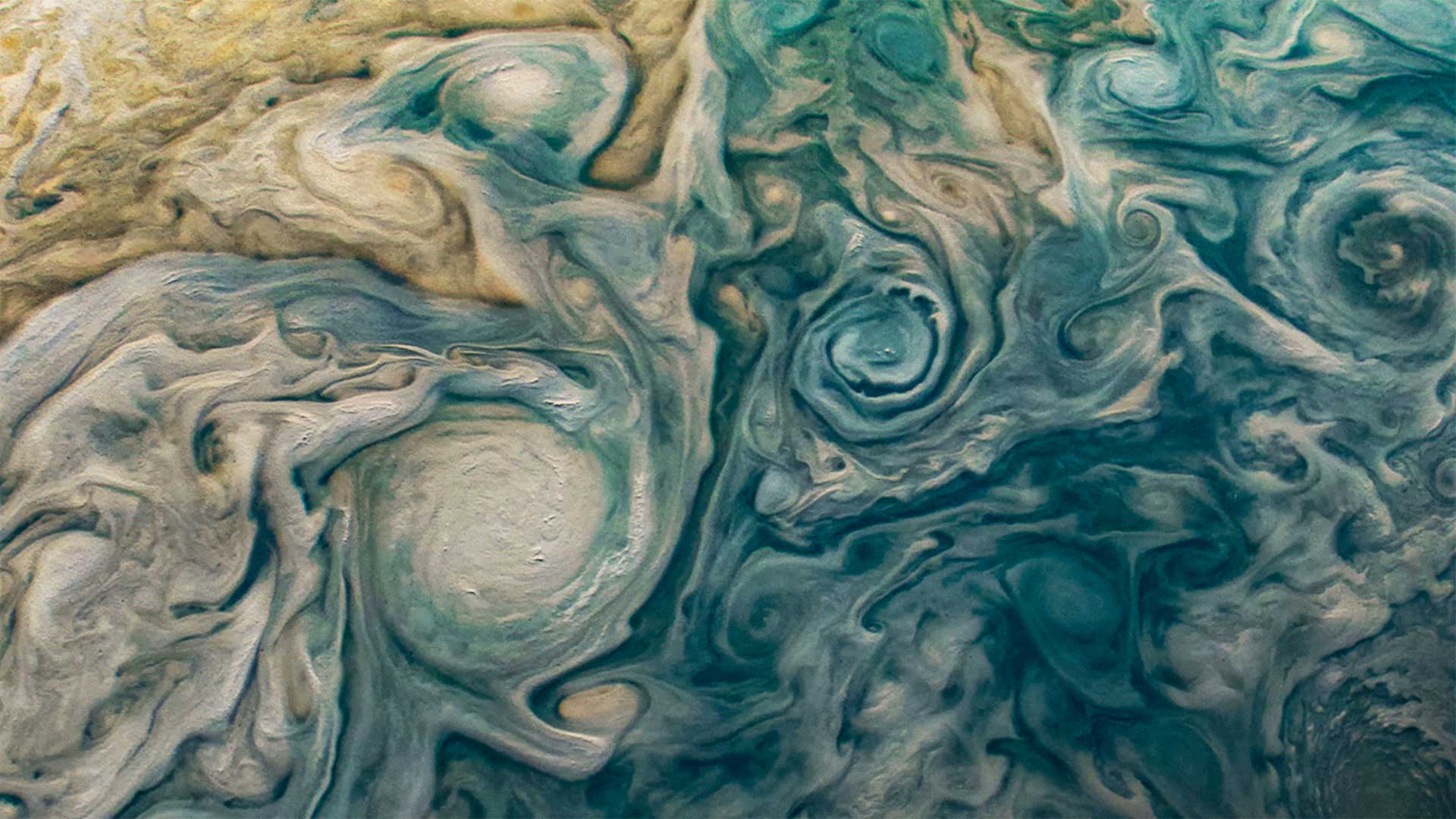NASA satellite image. Jupiter is a planet covered in storms. Thousands of kilometers across, these storms are larger than anything we see on Earth.