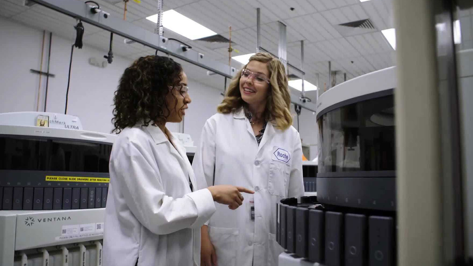 Roche senior manager Heidi Barnett, left, and Empire High School chemistry teacher Hillary Stacey at Roche/Ventana's Oro Valley lab. 