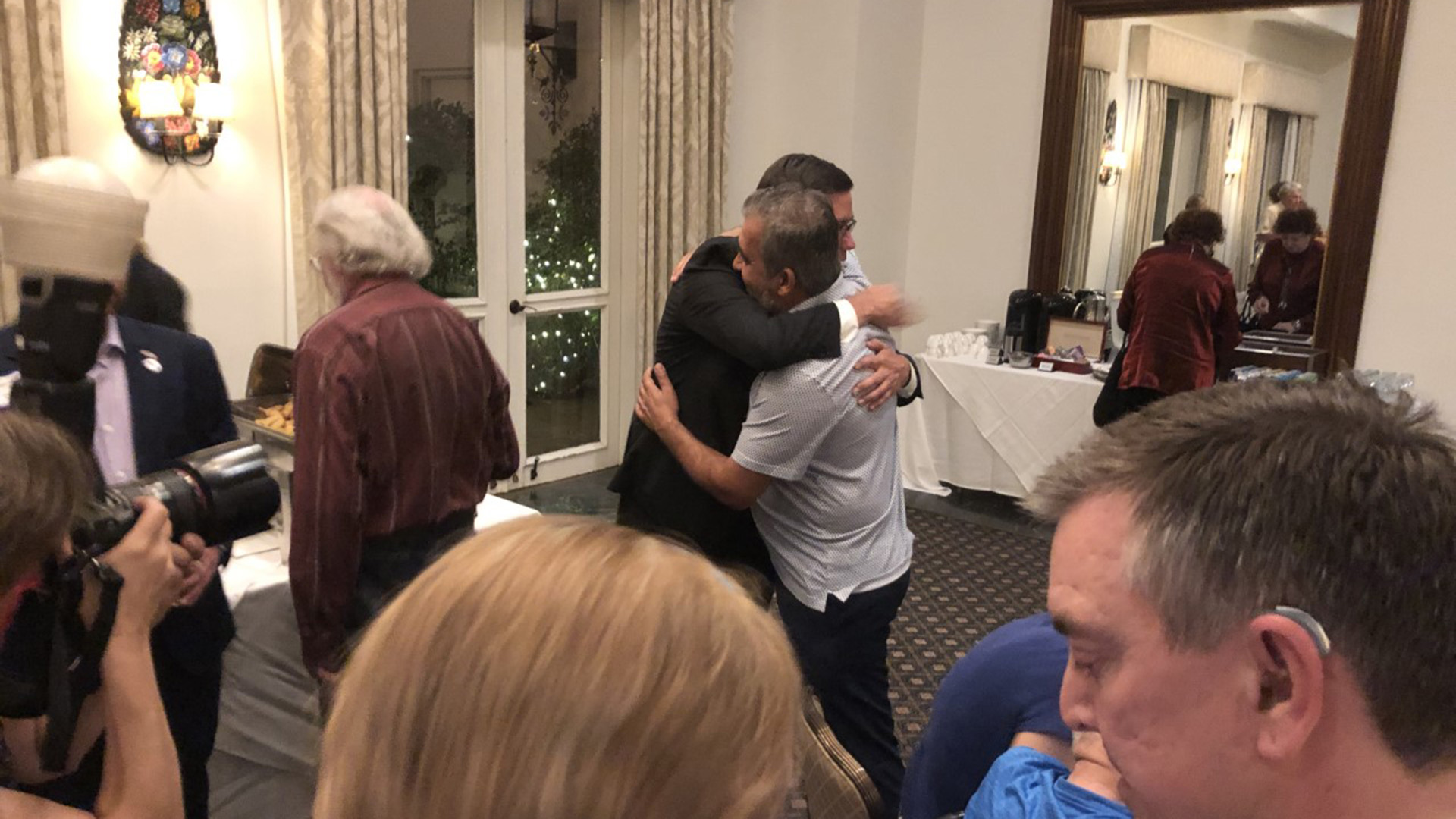 Farley hugs supporter