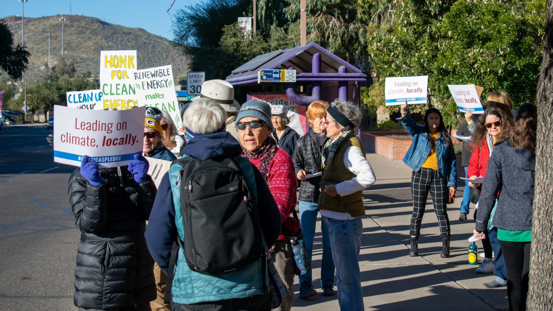 More than 20 people protested Tucson Electric Power's proposed rate hikes outside of the Arizona State Office Building in Tucson on Jan. 13, 2020.