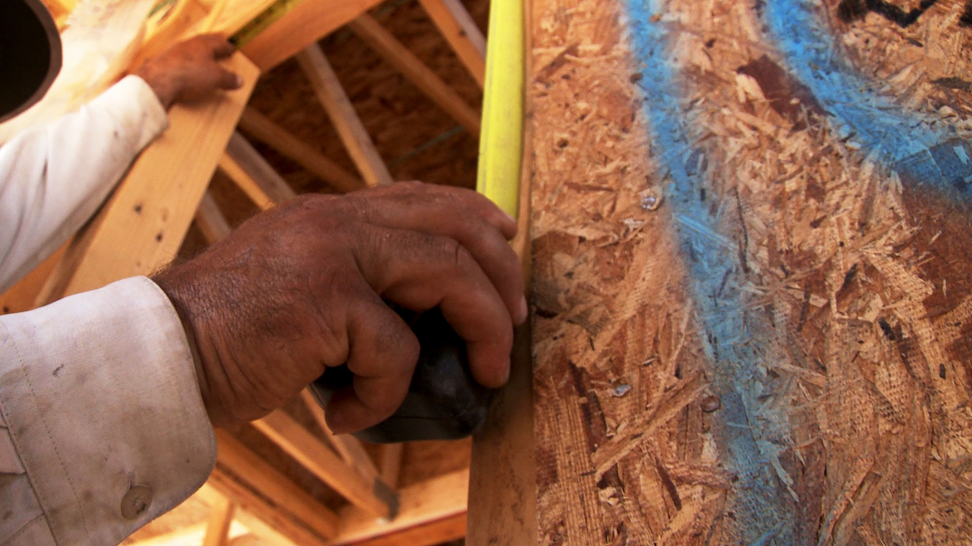 A construction worker at the site of a home build in Red Rock, Arizona. 