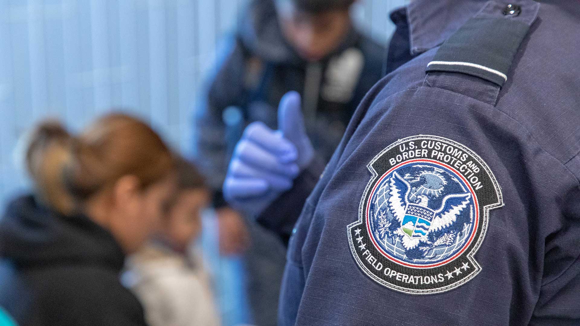 Migrants and Customs and Border Protection officers at the San Ysidro Port of Entry, November 2018.