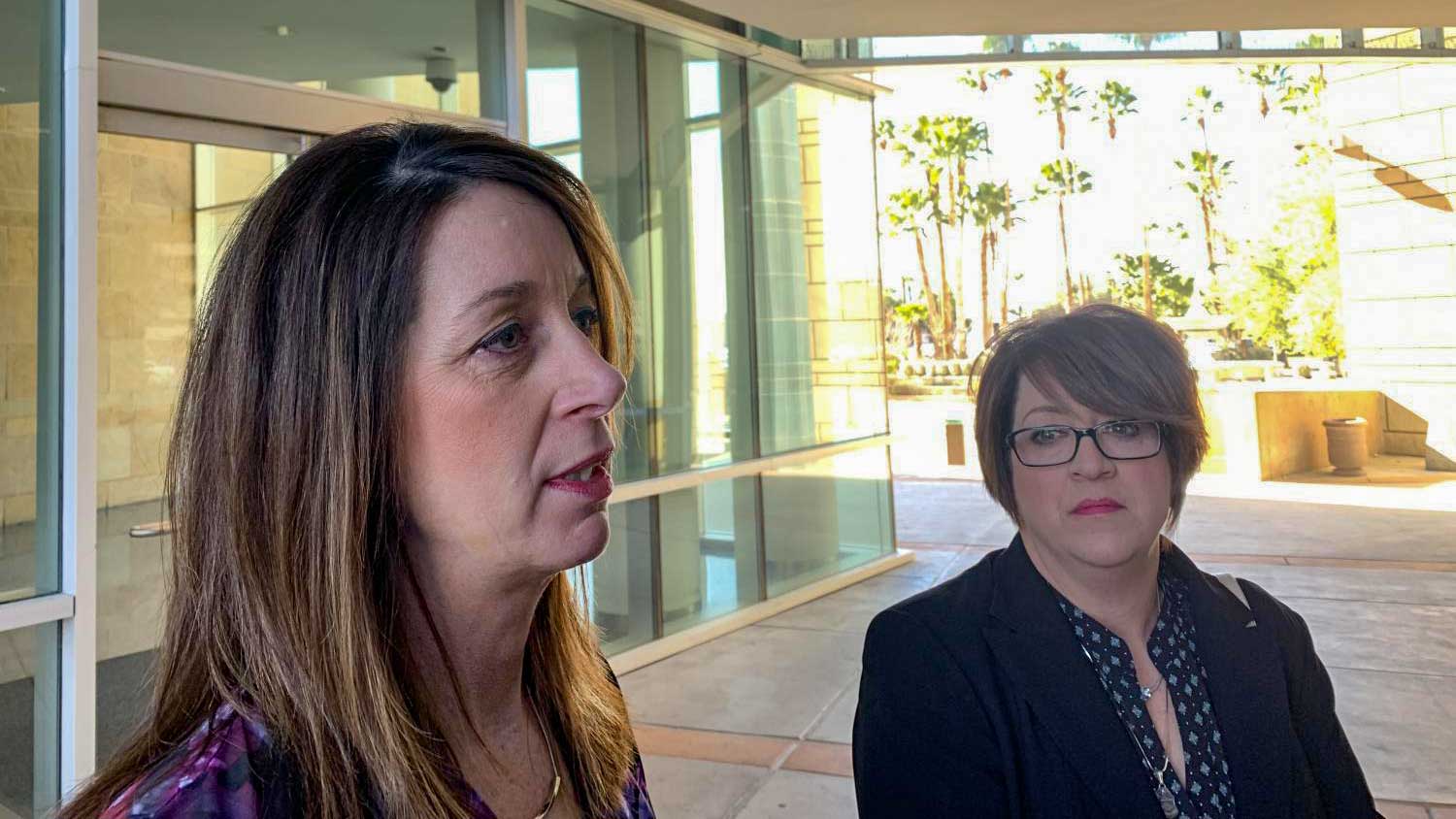 Kelly Willis and Michelle Balogh, Brian Terry's sisters, speak out the U.S. District Courthouse in Tucson following the life sentence imposed on Heraclio Osorio Arellanes.