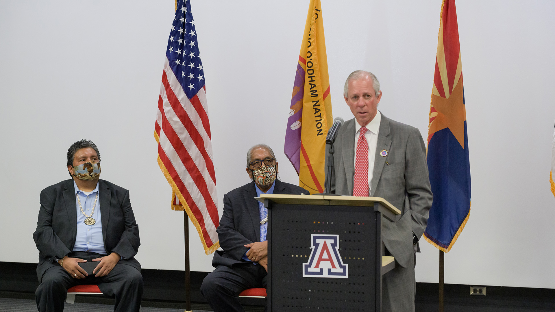 Tohono O'odham Nation Legislative Council Chairman Timothy Joaquin, Tohono O'odham Nation Chairman Ned Norris Jr., and University of Arizona President Robert Robbins at the press conference announcing the nation's donations to the UA and Arizona State University to further COVID-19 research Oct. 19, 2020.