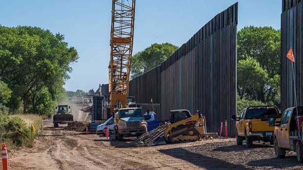 Construction nears the end on the wall section across the San Pedro River in October 2020.