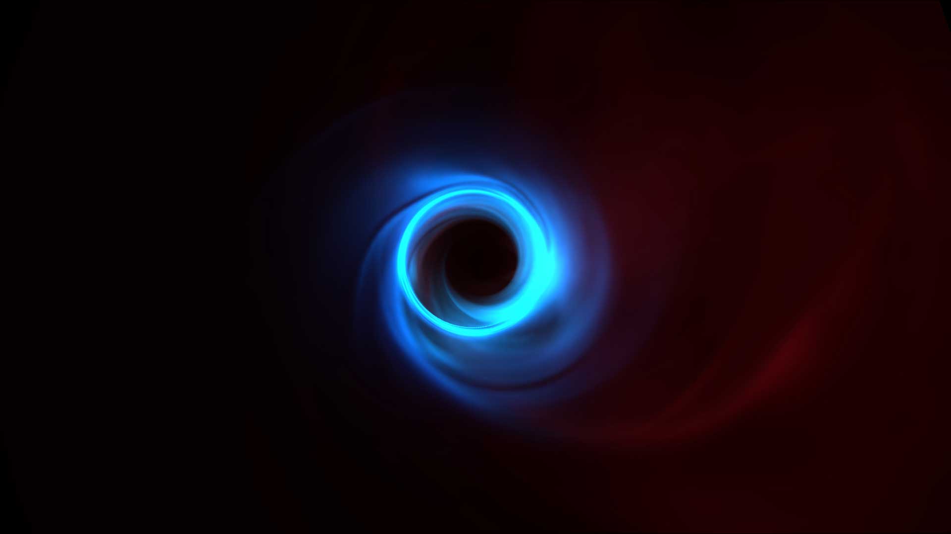 Simulation of M87 black hole showing bright blue thin ring — the edge of the black hole shadow.