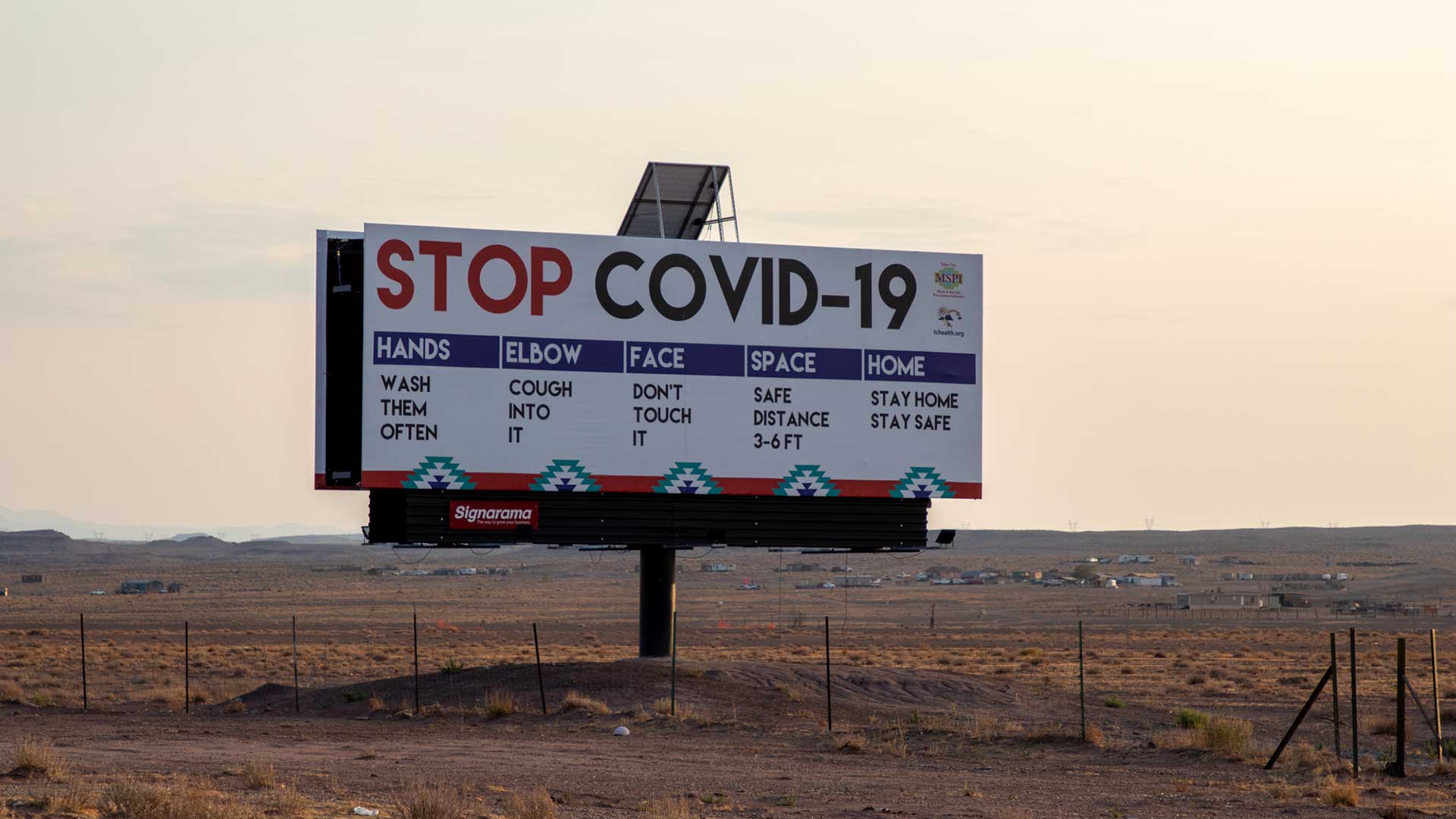 Legislation making its way through Congress aims to reaffirm that tribal epidemiology centers should have access to state and federal health data. Tribal leaders have had trouble accessing information to help fight COVID-19 and other diseases in places like the Navajo Nation, where this sign stands.