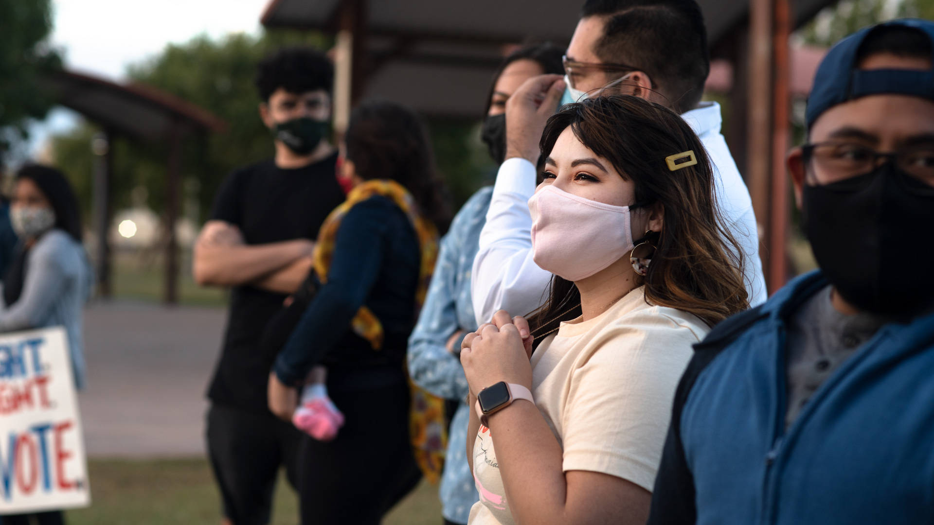 Aliento founder Reyna Montoya addresses a circle of other DACA recipients and mixed immigration status families on Nov. 7, 2020.