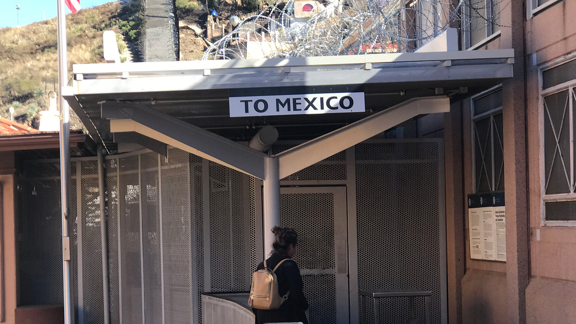 Morley Avenue foot crossing at the U.S. / Mexico border. The Sanchez teens cross here at least once a month to spend a night or two with their father.