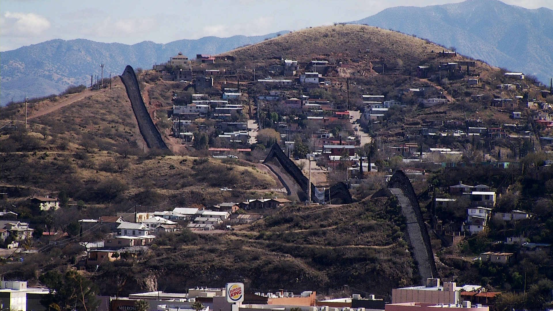 From Nogales, Arizona, a view of the city and its border wall with Nogales, Sonora. 