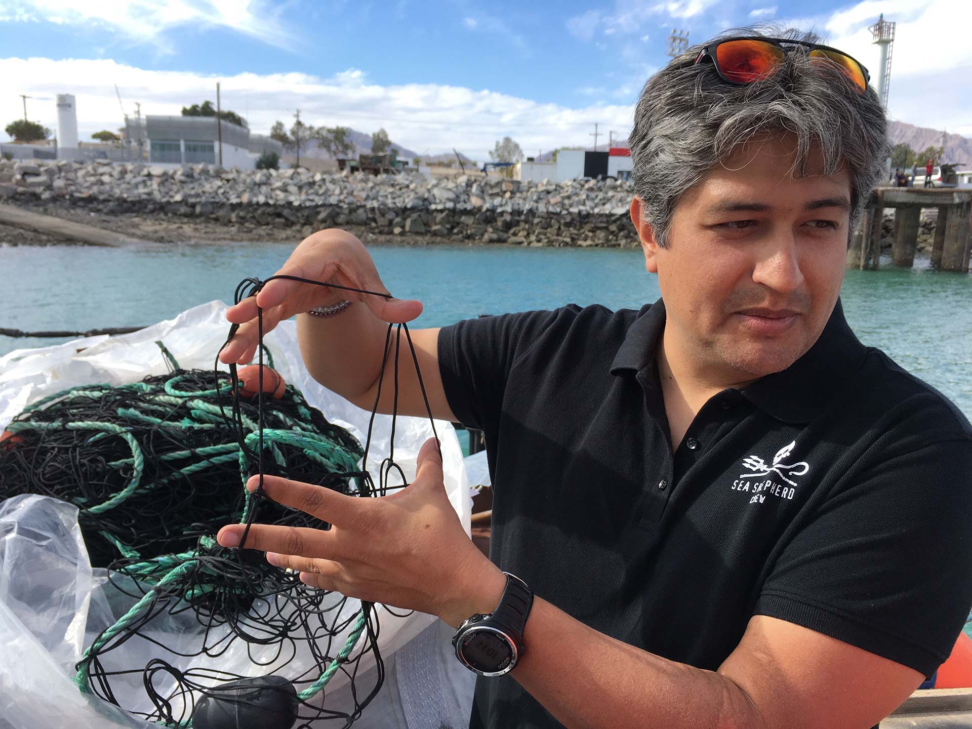 Sea Shepherd's JP Geoffroy demonstrates a gill net.