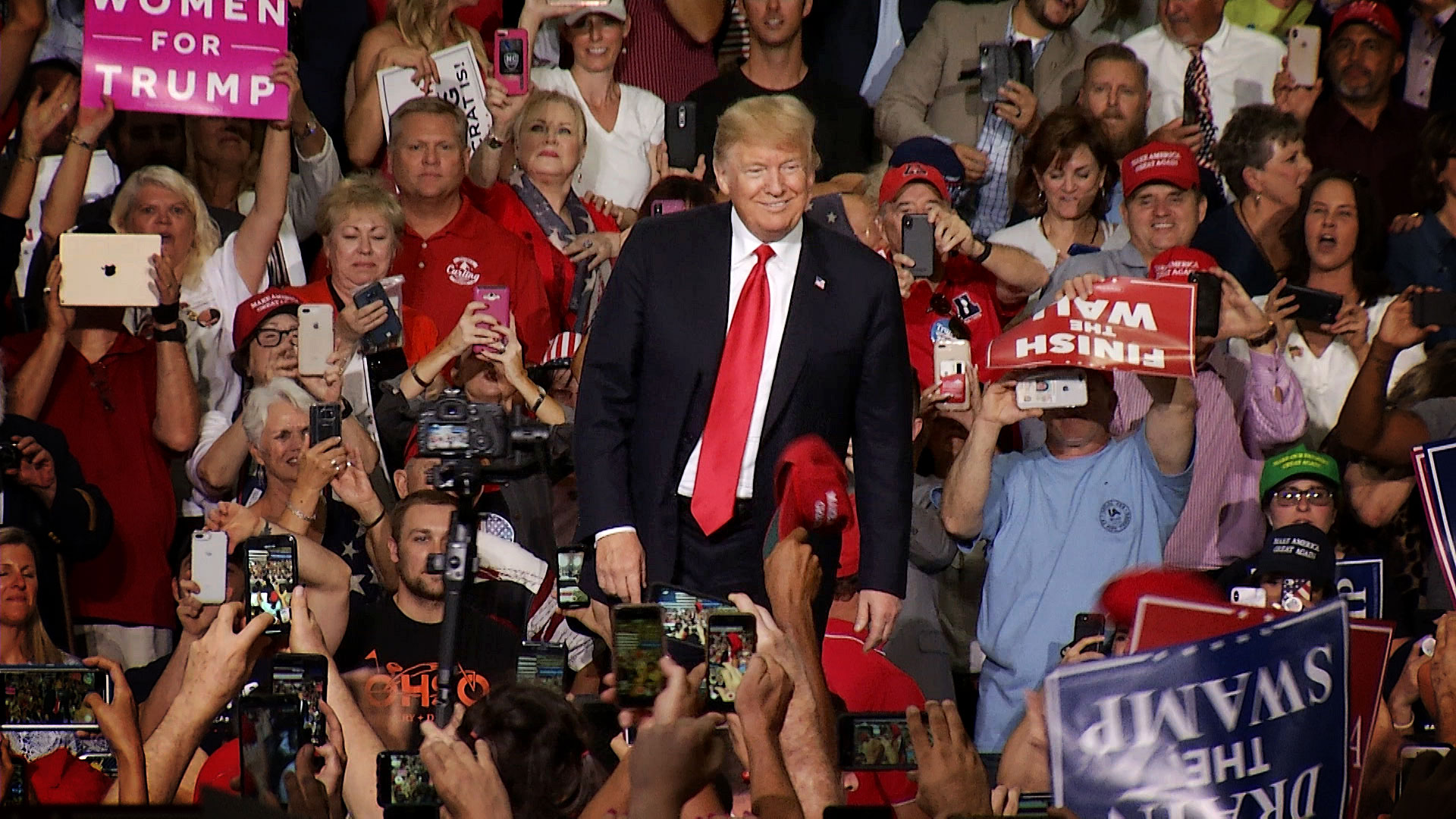 President Donald Trump greets the crowd at his rally at the Phoenix-Mesa Gateway Airport in October 2018.