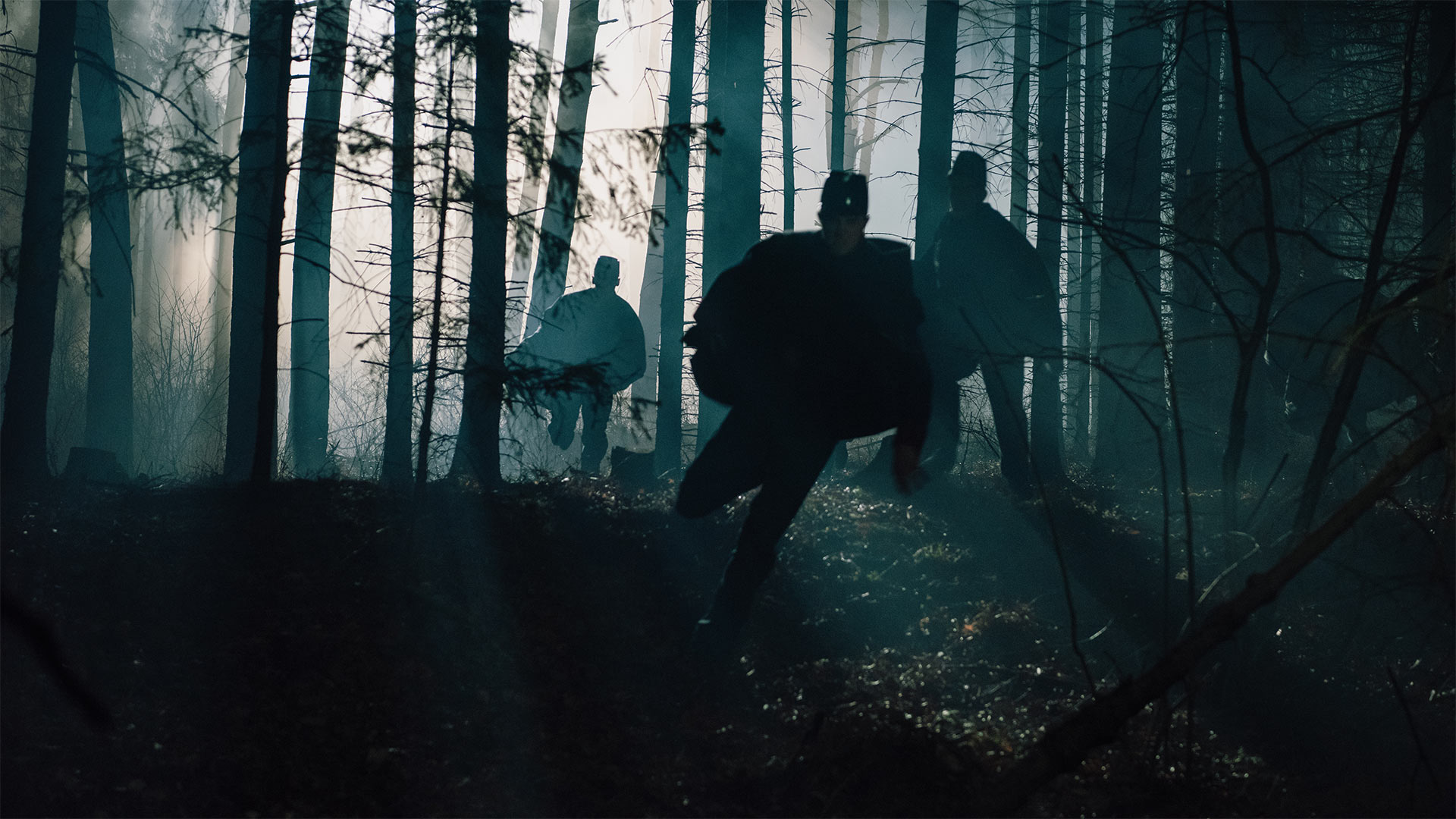 The boys at St. Florians give chase through the forest.