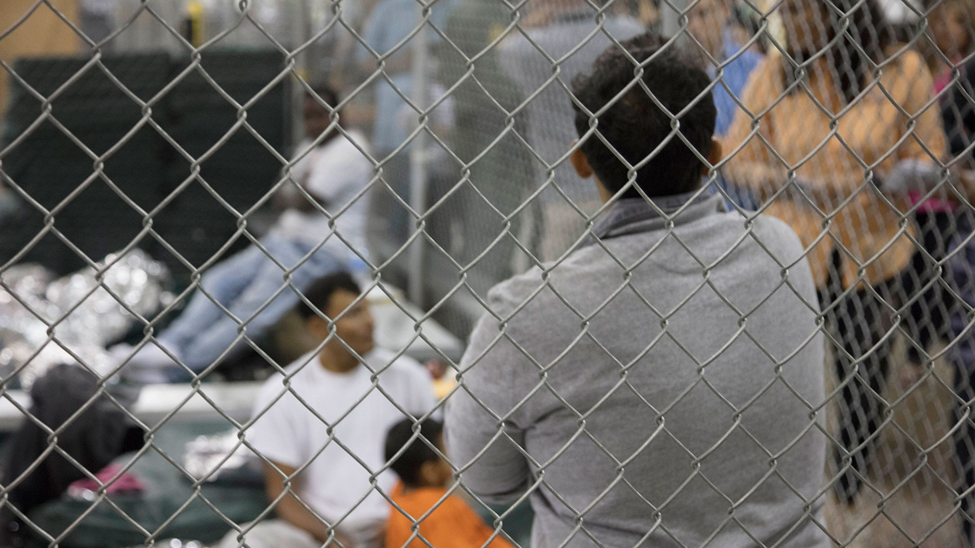 Border Patrol agents process migrants who crossed the border illegally in a facility in McAllen, Texas, in this photo from June 2018. A federal judge recently found overcrowded CBP facilities in the Tucson area have not met “basic human needs.”