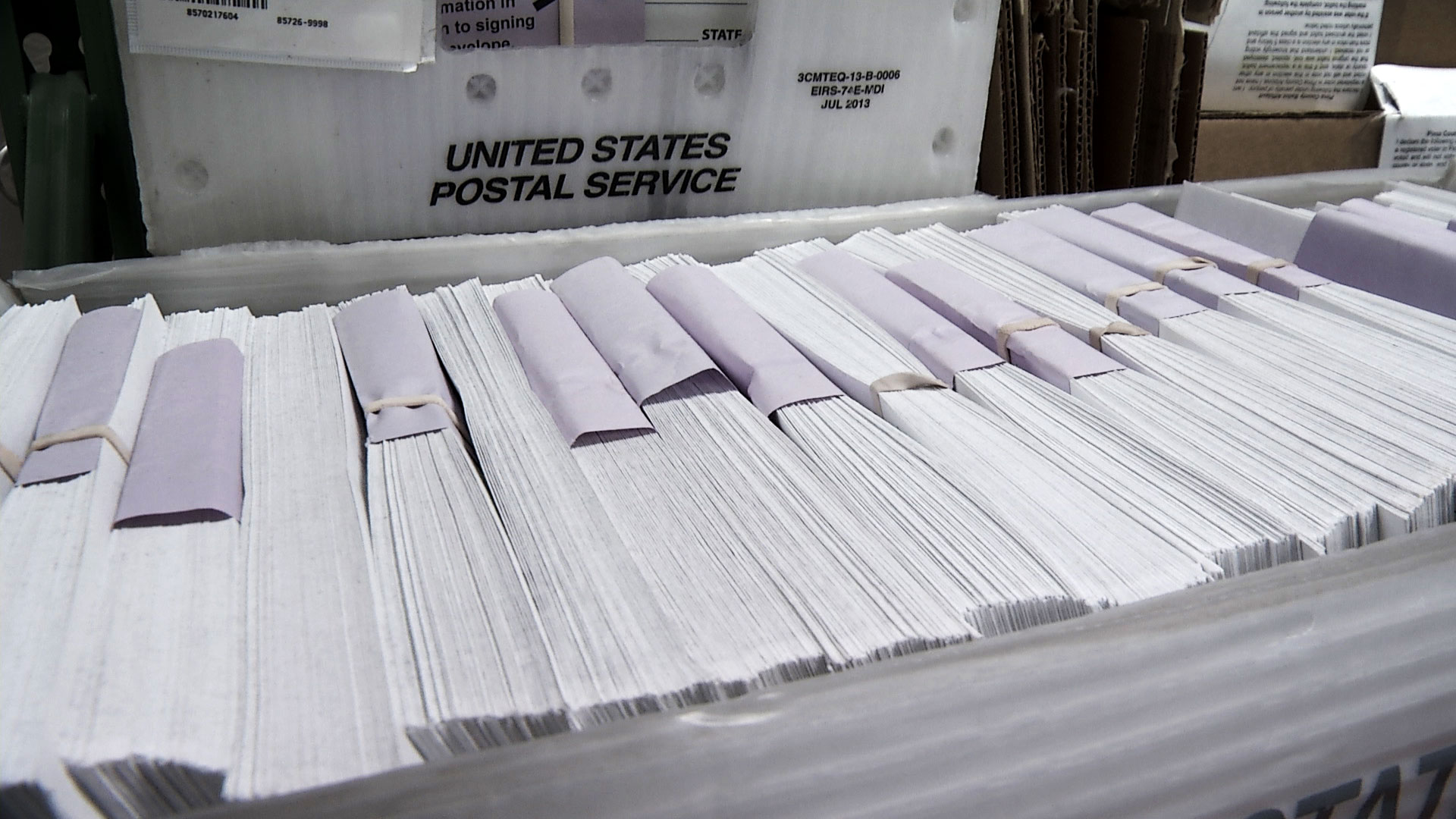 File photo of a crate containing ballots at the Pima County Elections Department. 