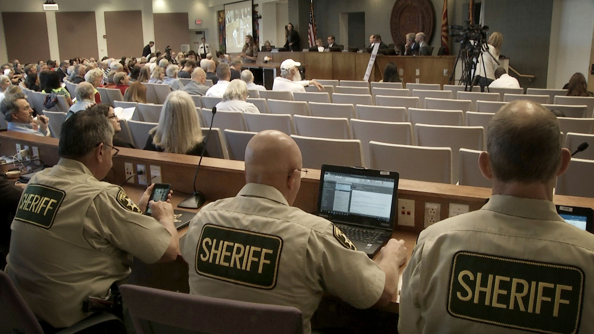Law enforcement with the Pima County Sheriff's Department at a Pima County Board of Supervisors meeting in May 2019. 