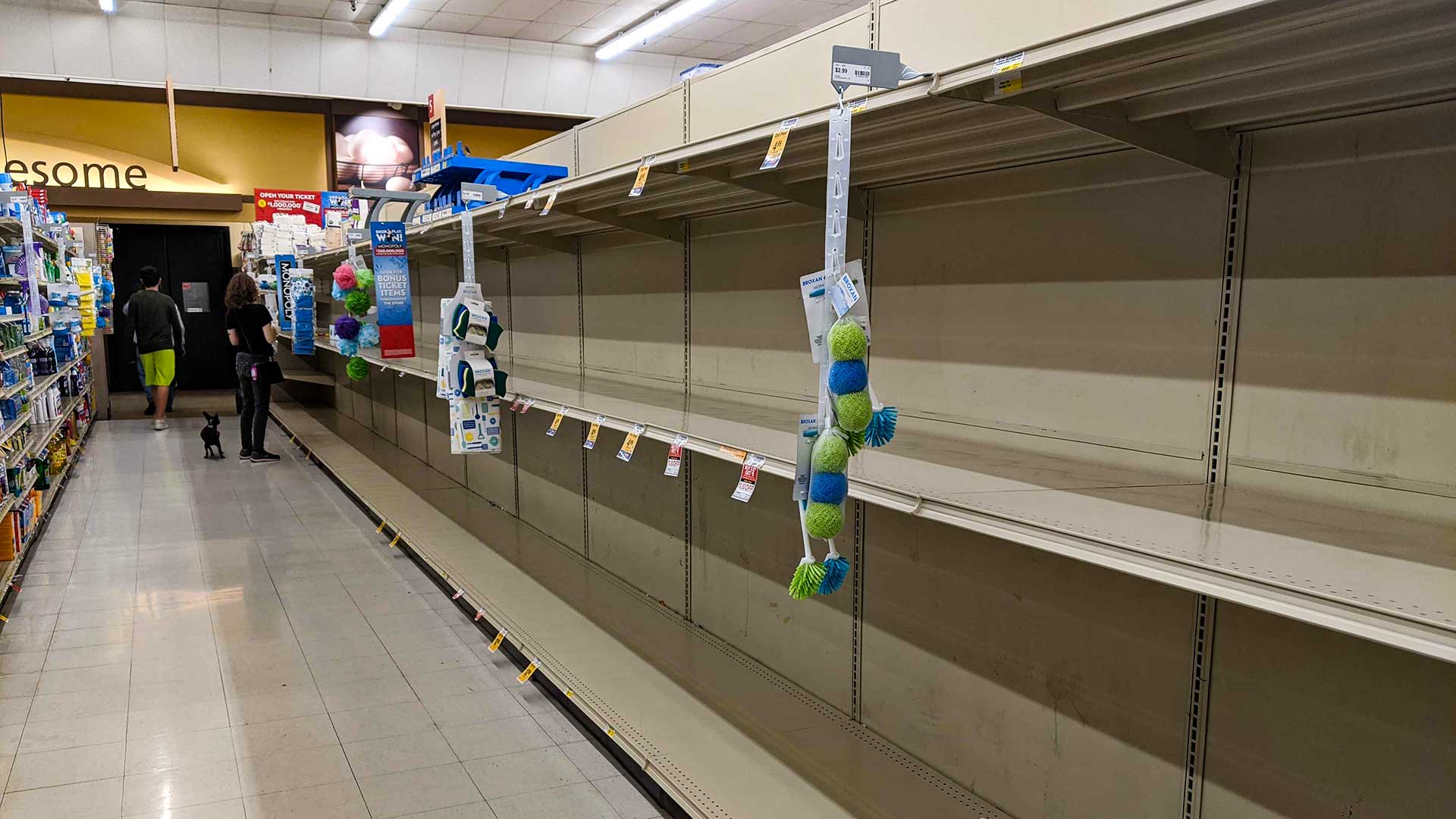 Shelves for paper products lie bare in a Tucson grocery store, as people act on fears over the COVID-19 pandemic. Health officials have urged people to not panic and hoard. Toilet paper is not an item listed in official guidance for staying healthy and limiting the spread of the novel coronavirus.