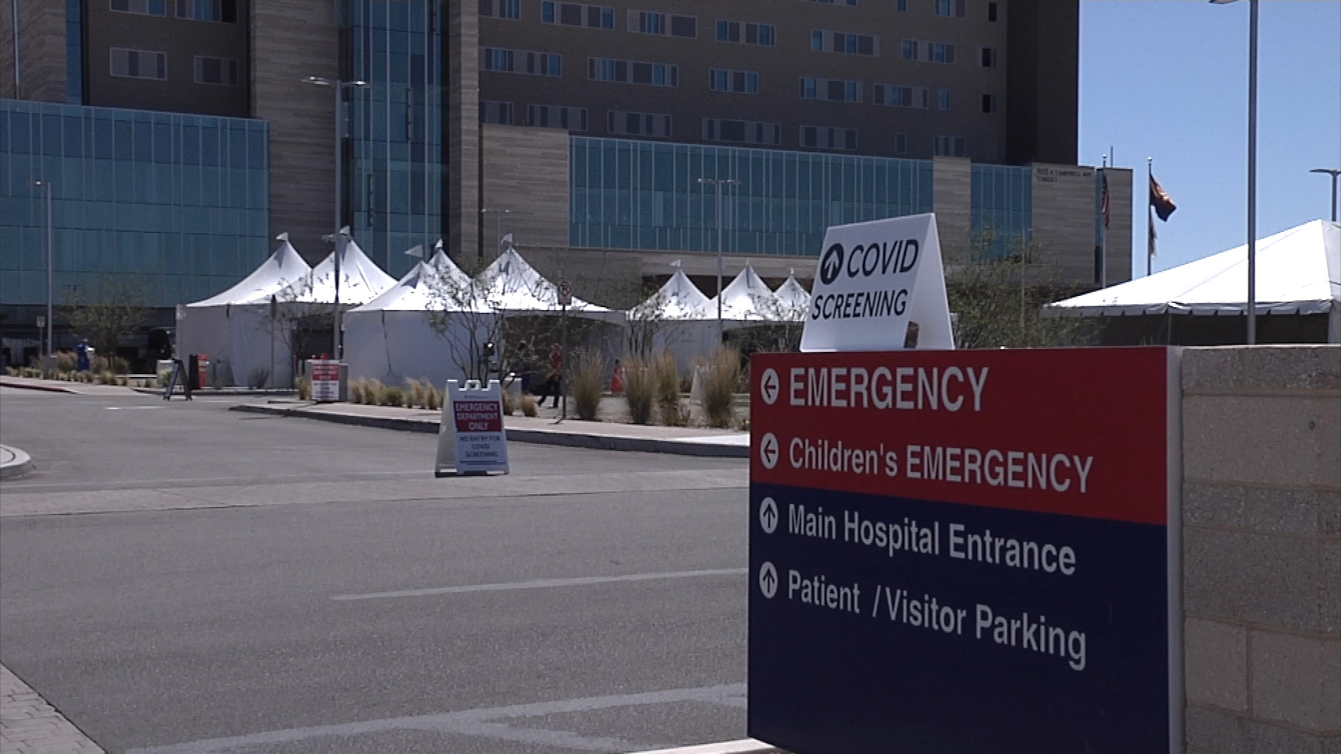 Saturday, March 21 image shows a sign at Banner-University Medical Center that reads "COVID screening." Banner in a statement on March 23 said it had implemented drive-through COVID-19 <a href="http://bannerhealth.mediaroom.com/covid-19specimen0323" target="_blank">specimen collection</a>. The release stressed that the testing was by appointment only, and that those with concerns can call 1-844-549-1851 to determine if testing is appropriate. The release said there would be one Tucson location, and three in Phoenix.
