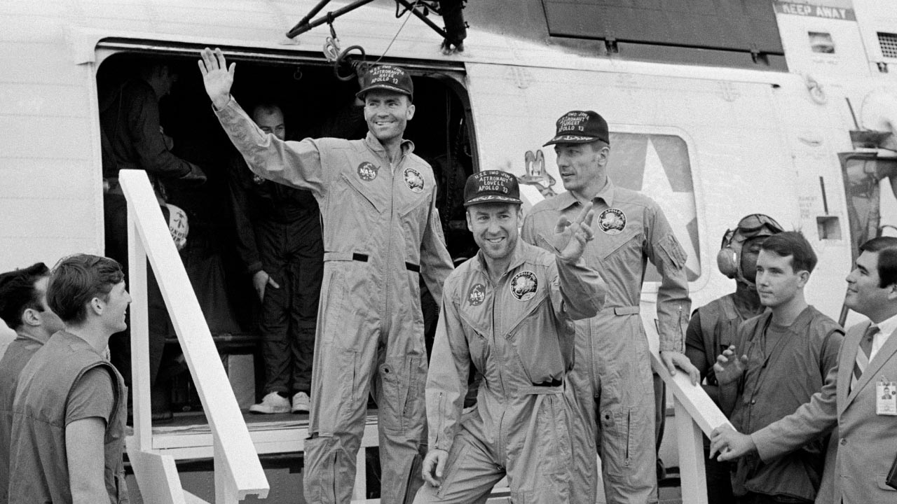 NASA astronauts (from left), Fred Haise, Jim Lovell and Jack Swigert aboard the U. S. aircraft carrier Iwo Jima April 17, 1970.