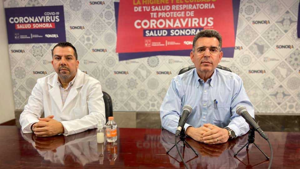 Sonora Health Secretary Enrique Clausen, right, announces the implementation of the second phase of the state's stay-at-home measures, which strictly prohibits movement except for six essential reasons.